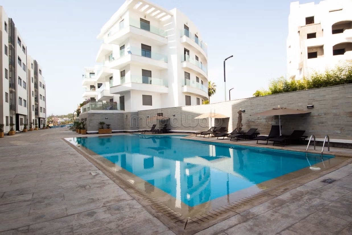 Appartement à louer courte durée à Agadir bay secteur touristique 
deux chambre salon cuisine équipée superficie 75 mètres carrés piscine à 300 mètres de la plage - Photo 9