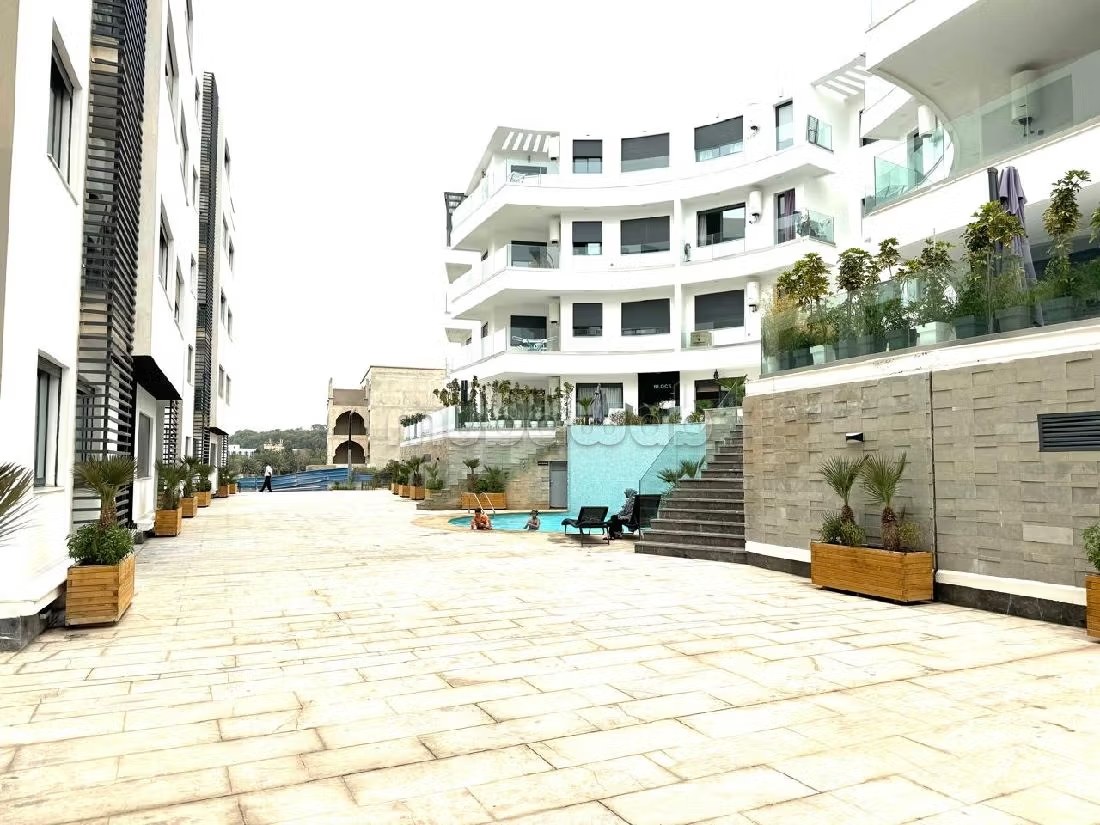 Appartement à louer courte durée à Agadir bay secteur touristique 
deux chambre salon cuisine équipée superficie 75 mètres carrés piscine à 300 mètres de la plage - Photo 6