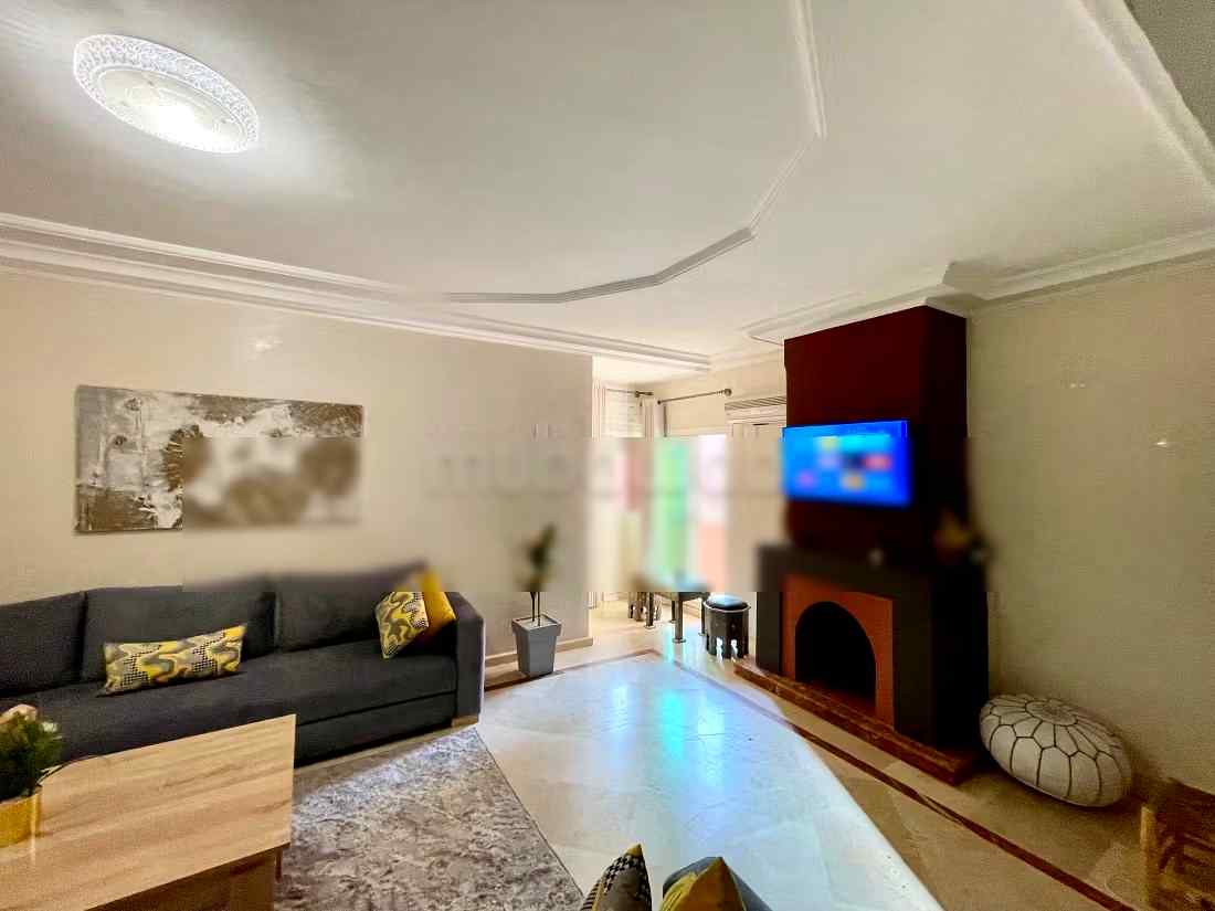 Location saisonnière à Guéliz. 2 chambres. Salon traditionnel marocain, résidence sécurisée