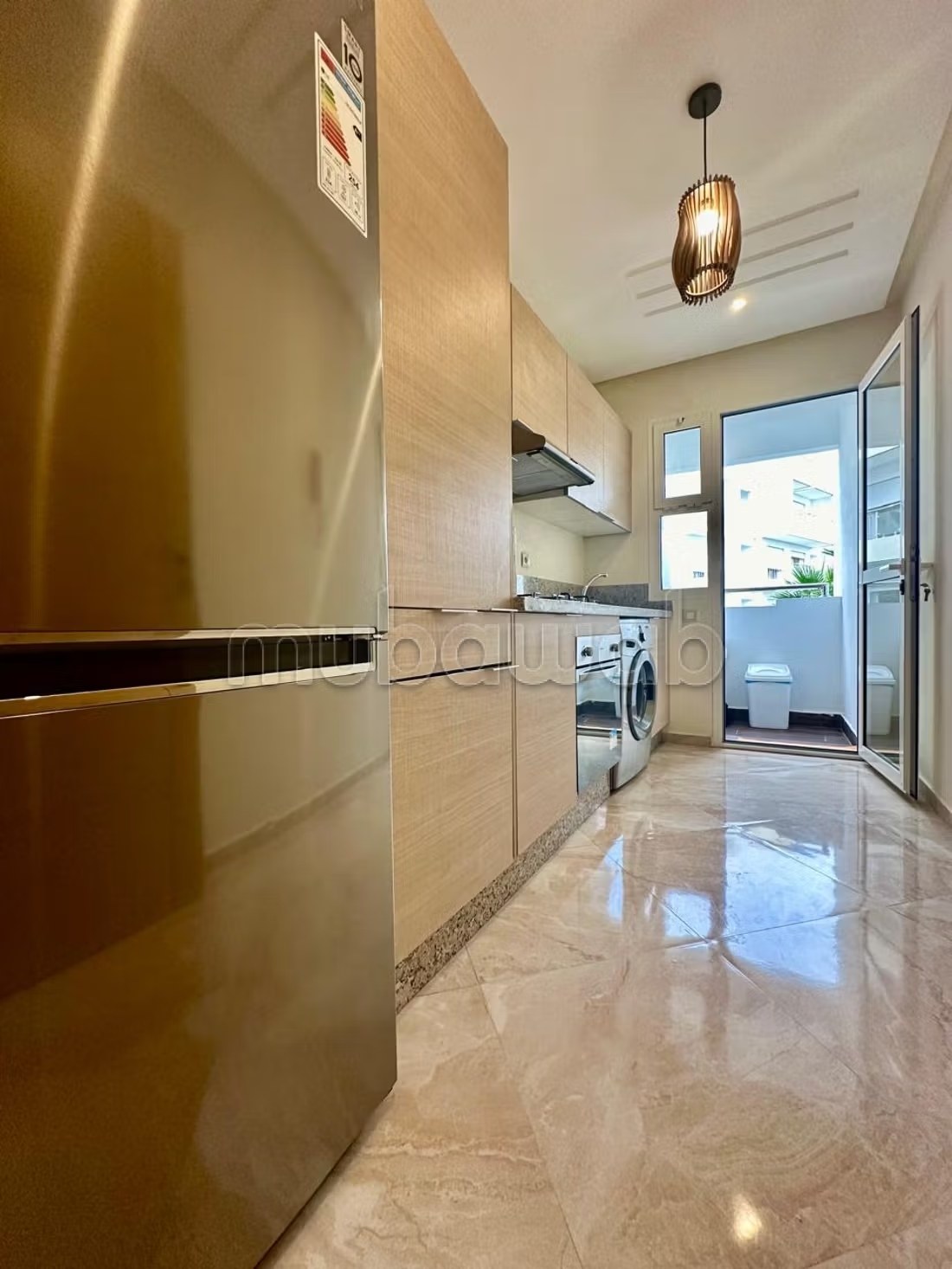 Location d'un appartement à Assanaouber. 
Superficie 74 m². 
Terrasse et ascenseur - Photo 6